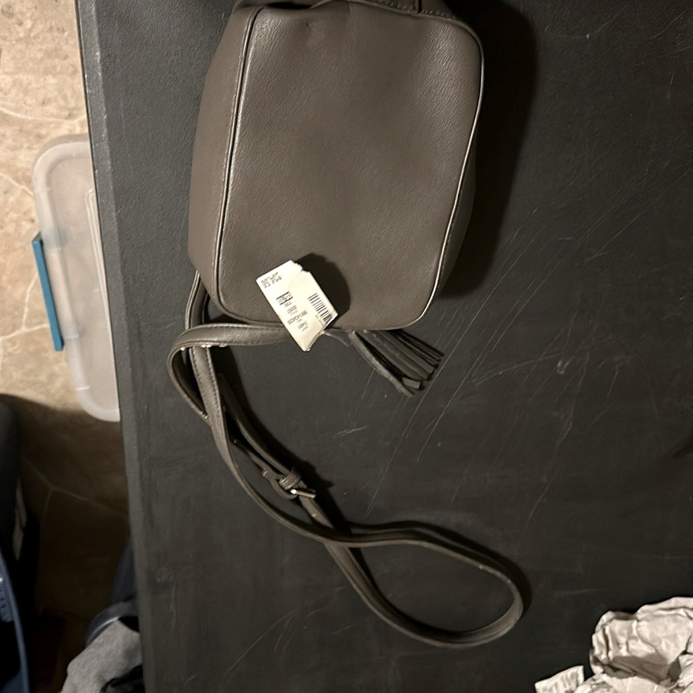 Aeropostale Grey Compact purse with shoulder strap and leather fray dazzle.